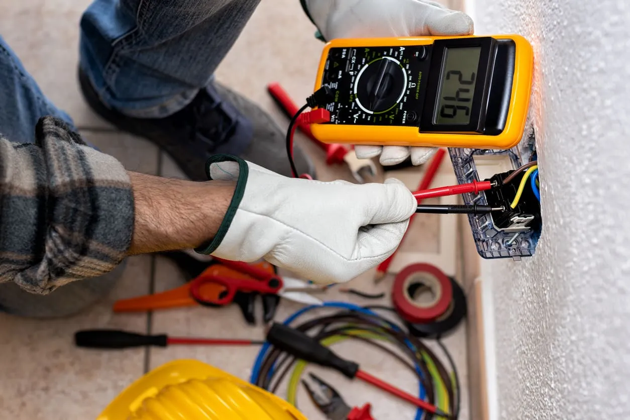 Electrician Working on Electrical System