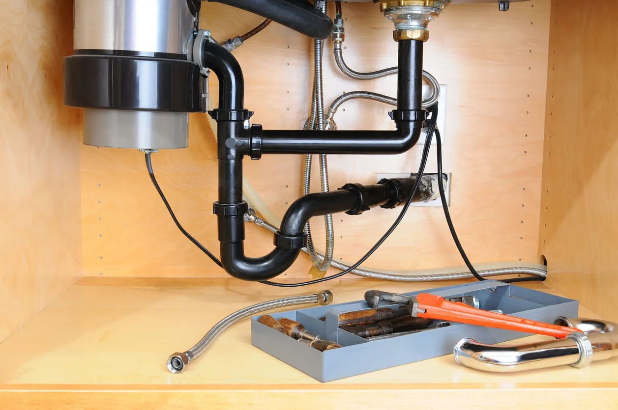 Plumbing Tools Under Kitchen Sink